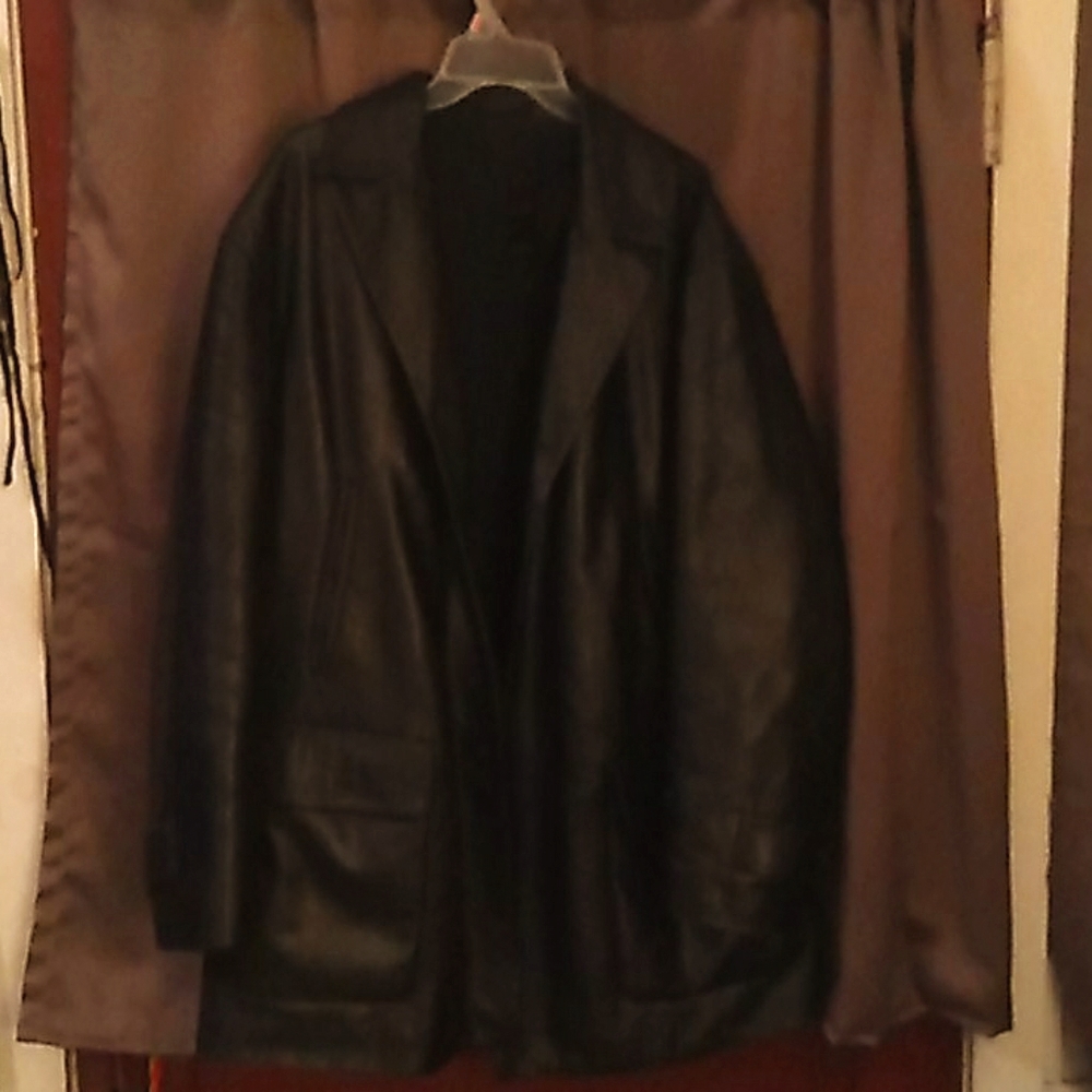 Mid length lambskin soft leather jacket. Like new!